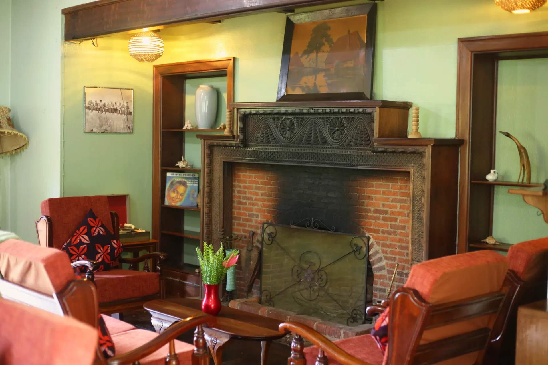 The library and fireplace in the main house at Mullers