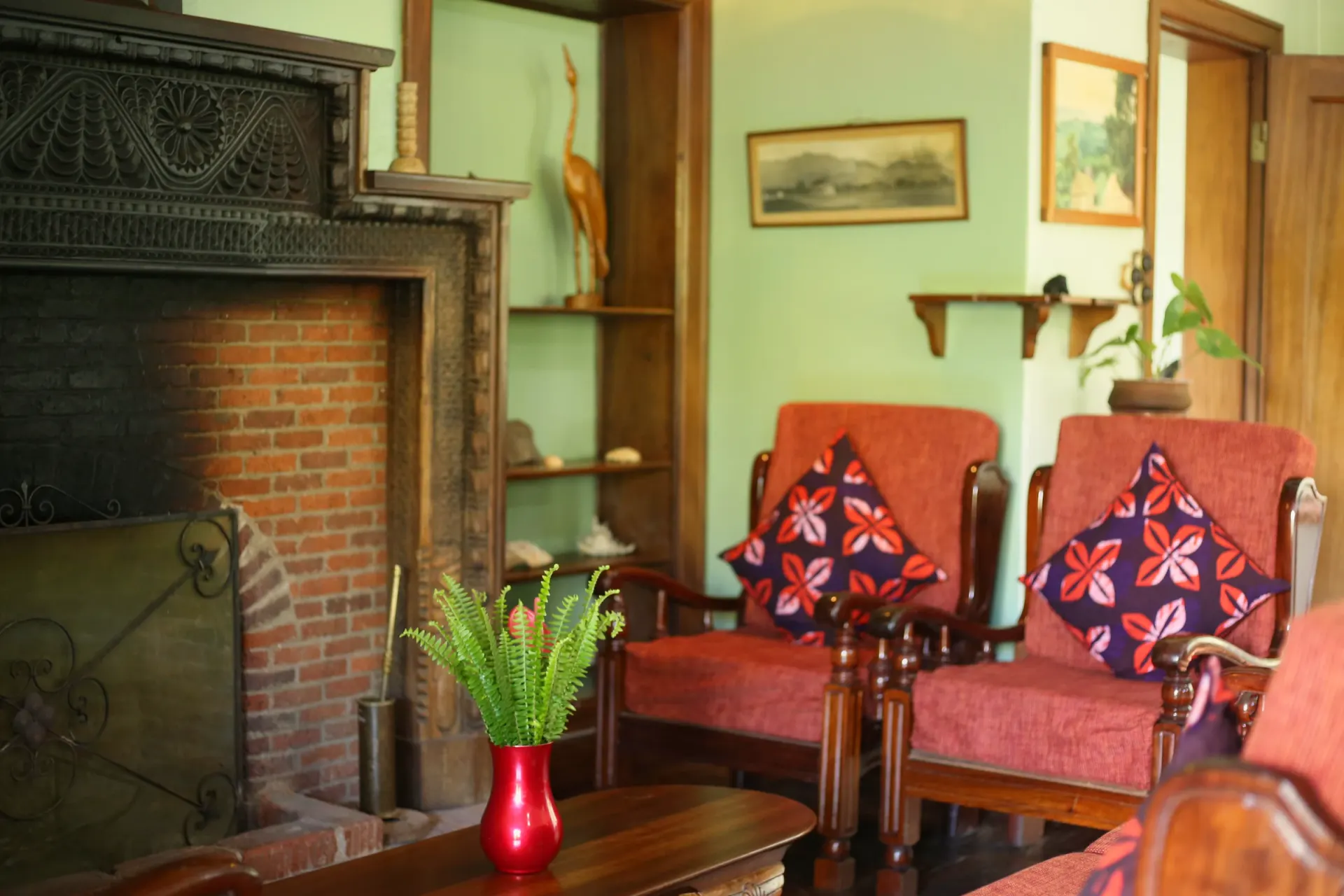 The library and fireplace in the main house at Mullers